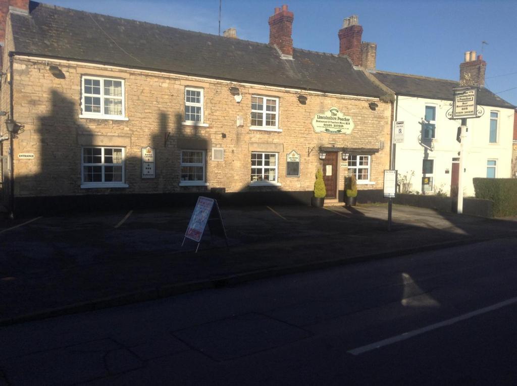 The Lincolnshire Poacher Inn Metheringham Buitenkant foto